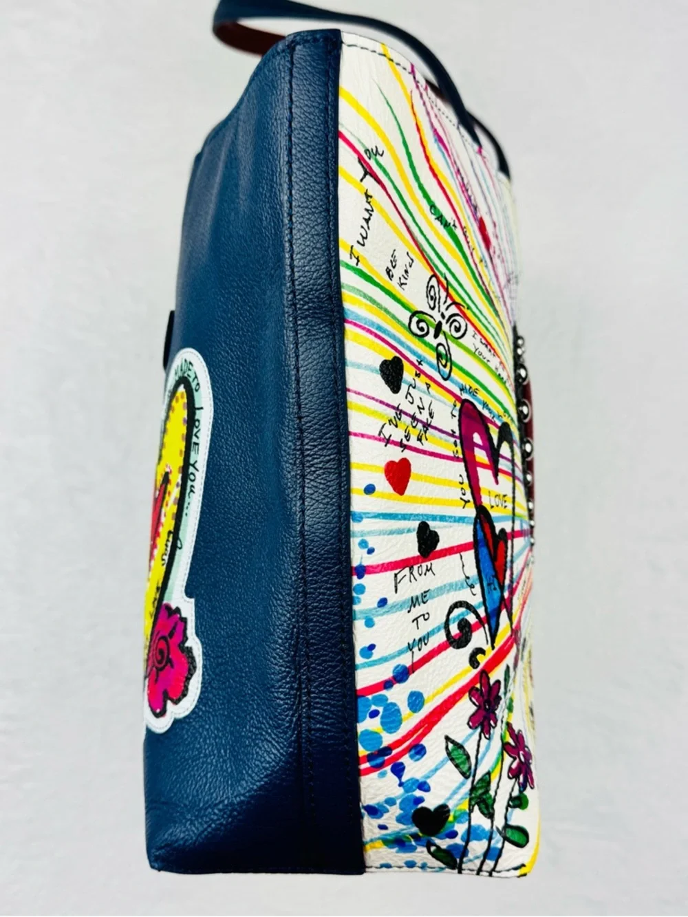 Brighton The Art of Love Tote, featuring a vibrant hand-drawn artwork.